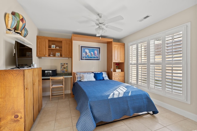 bedroom featuring ceiling fan and light tile patterned floors