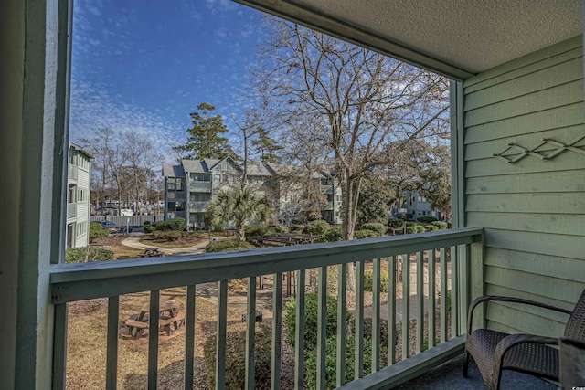 balcony featuring a residential view