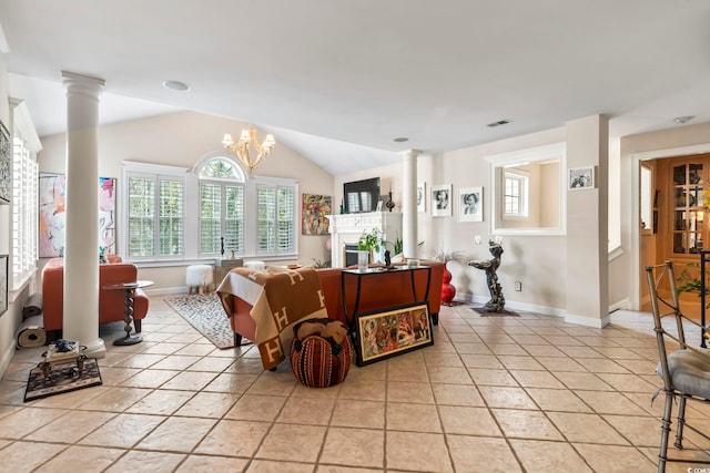 bedroom featuring vaulted ceiling, light tile patterned flooring, a chandelier, and decorative columns