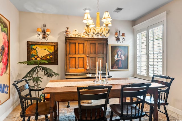 dining room with an inviting chandelier