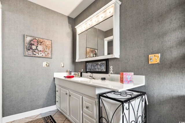 bathroom featuring tile patterned floors and vanity