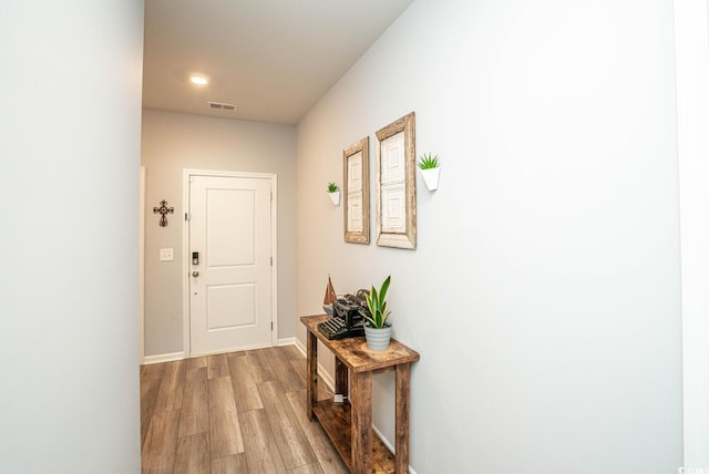 hall featuring light wood-type flooring