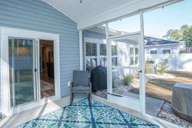 sunroom with vaulted ceiling