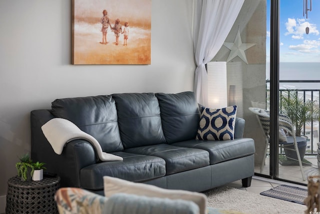 living room featuring a water view