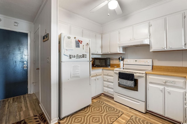 kitchen with ceiling fan, white appliances, light wood-type flooring, ornamental molding, and white cabinets