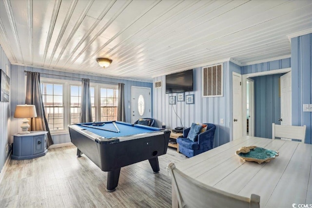 playroom featuring light hardwood / wood-style floors, wood ceiling, billiards, and wooden walls