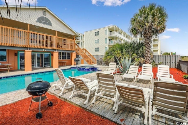 view of pool featuring an in ground hot tub and area for grilling