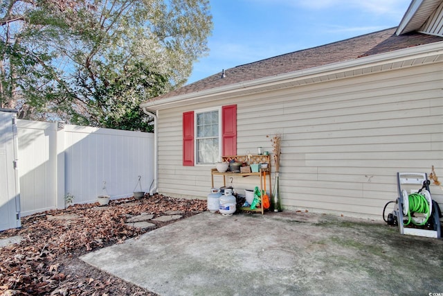 view of side of property featuring a patio area