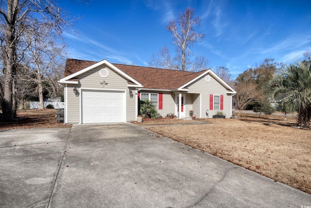 ranch-style house featuring a garage