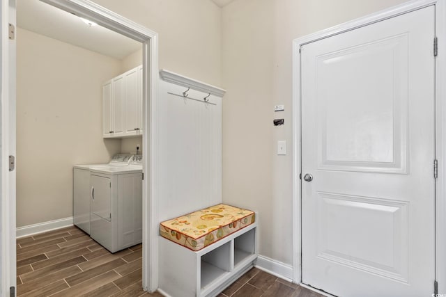 mudroom with independent washer and dryer