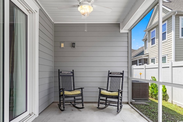 view of patio / terrace with ceiling fan and central AC unit