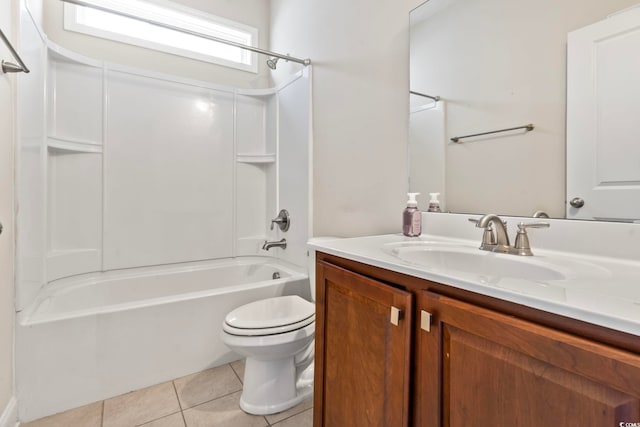 full bathroom with tub / shower combination, toilet, vanity, and tile patterned flooring