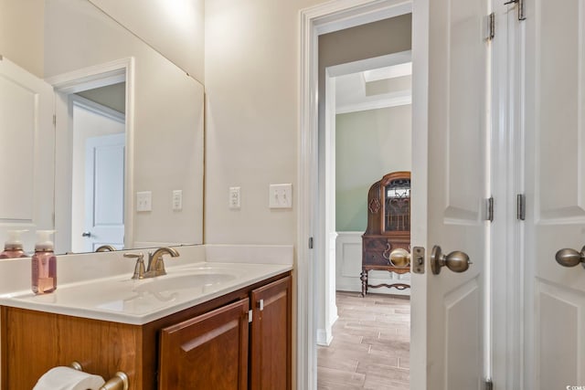 bathroom featuring hardwood / wood-style floors and vanity