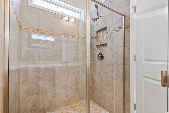 bathroom featuring an enclosed shower