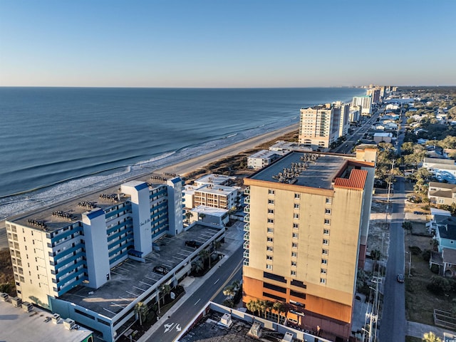 aerial view featuring a water view and a view of the beach