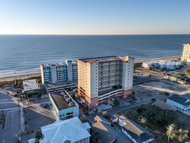 bird's eye view with a view of the beach and a water view