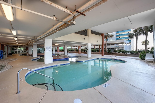 view of pool with a patio