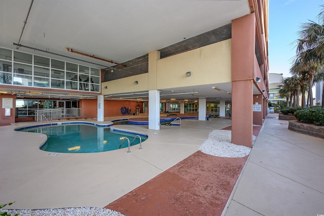 view of pool featuring a patio