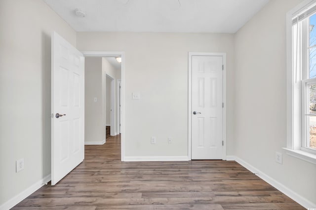 spare room featuring hardwood / wood-style flooring