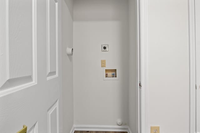 laundry room featuring hookup for a washing machine, electric dryer hookup, and hardwood / wood-style floors