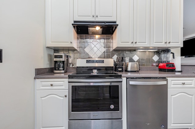 kitchen featuring decorative backsplash, extractor fan, stainless steel appliances, and white cabinetry