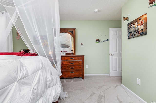 carpeted bedroom with a textured ceiling