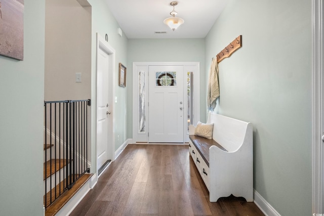 foyer with dark hardwood / wood-style flooring