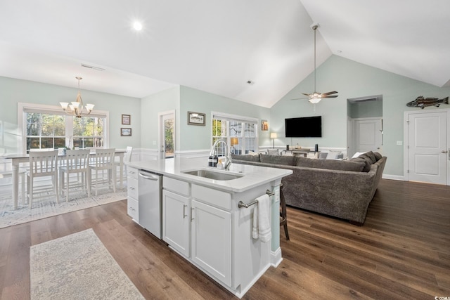 kitchen featuring dishwasher, a center island with sink, wood-type flooring, sink, and white cabinetry