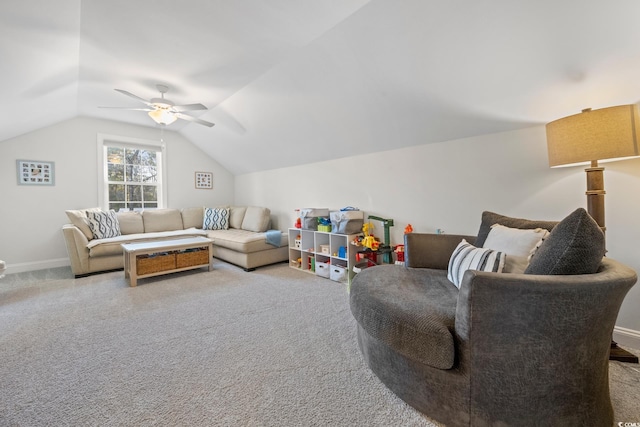 living room with ceiling fan, light carpet, and vaulted ceiling