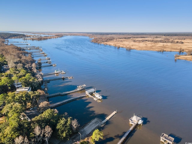 drone / aerial view featuring a water view