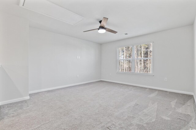 unfurnished room featuring dark wood-type flooring and ceiling fan