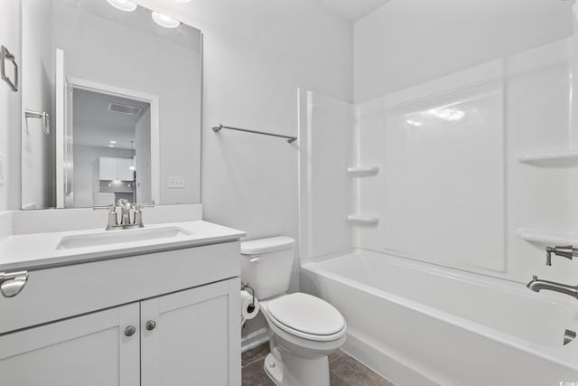 full bathroom with vanity, shower / bathing tub combination, and toilet