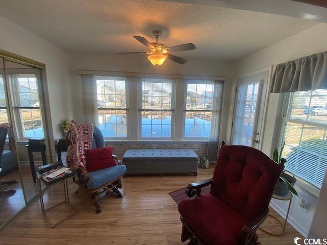 8650 Southbridge Dr Unit A, Surfside Beach, SC 29575 - sunroom featuring plenty of natural light