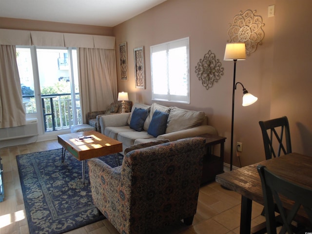 living room featuring a healthy amount of sunlight