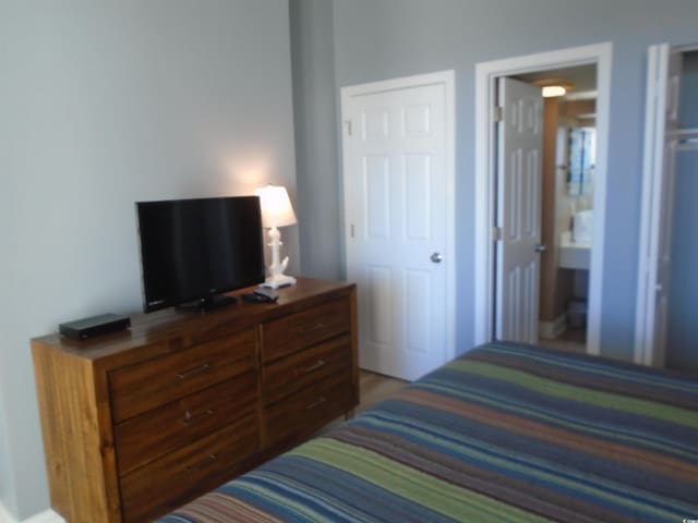 bedroom featuring ensuite bath