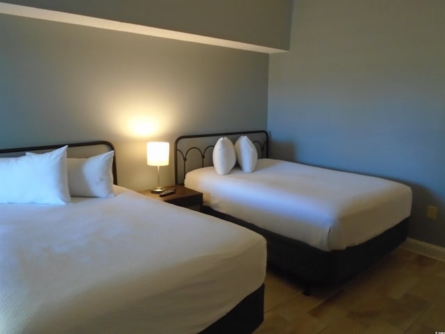 bedroom featuring light wood-style flooring