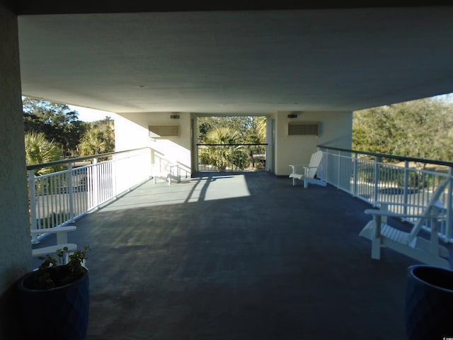 balcony with an AC wall unit