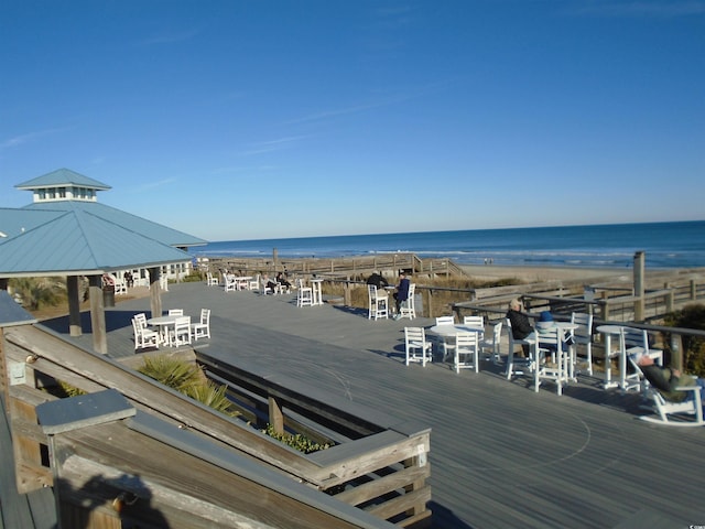 property view of water featuring a beach view