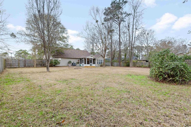 view of yard featuring a sunroom