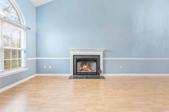 unfurnished living room featuring light hardwood / wood-style flooring