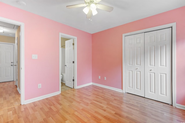 unfurnished bedroom with ceiling fan, connected bathroom, and light hardwood / wood-style flooring