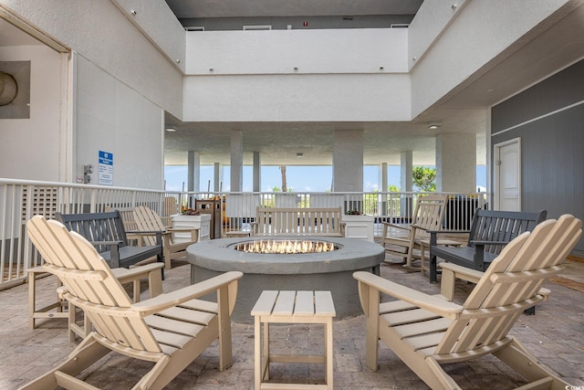 view of patio / terrace with an outdoor fire pit