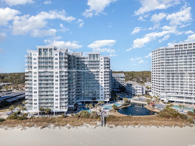 view of property with a water view