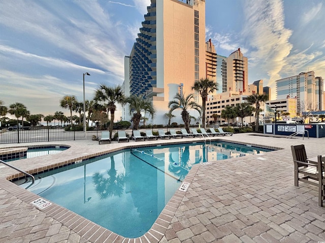 view of pool featuring a patio area