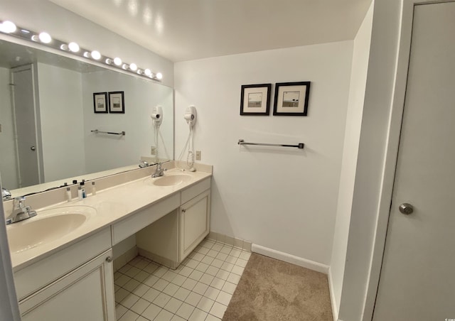 bathroom with vanity and tile patterned flooring