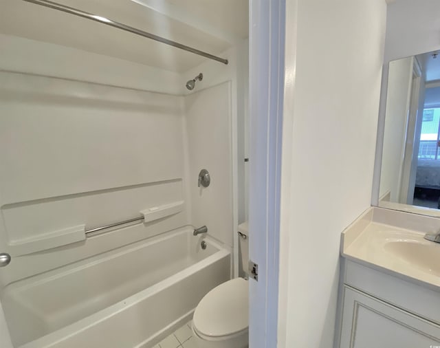 full bathroom featuring tile patterned floors, shower / bathing tub combination, vanity, and toilet