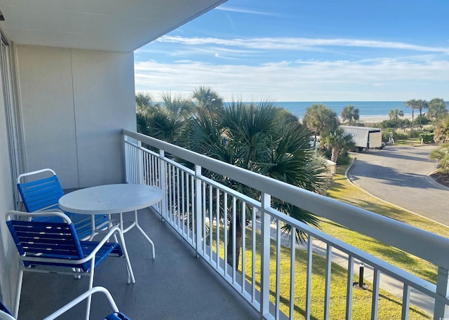 balcony featuring a water view