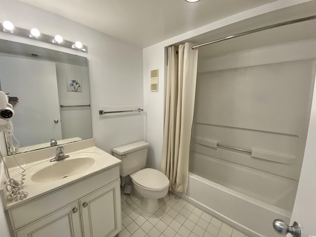 full bathroom featuring toilet, vanity, tile patterned floors, and shower / bathtub combination with curtain