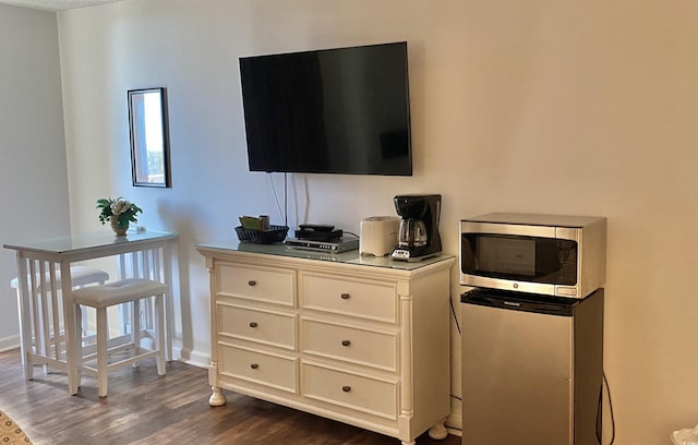 interior details featuring hardwood / wood-style flooring