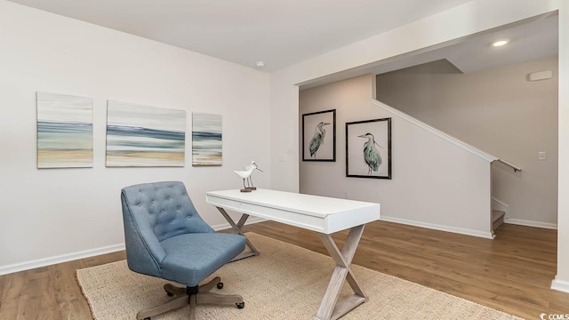 office area with wood-type flooring